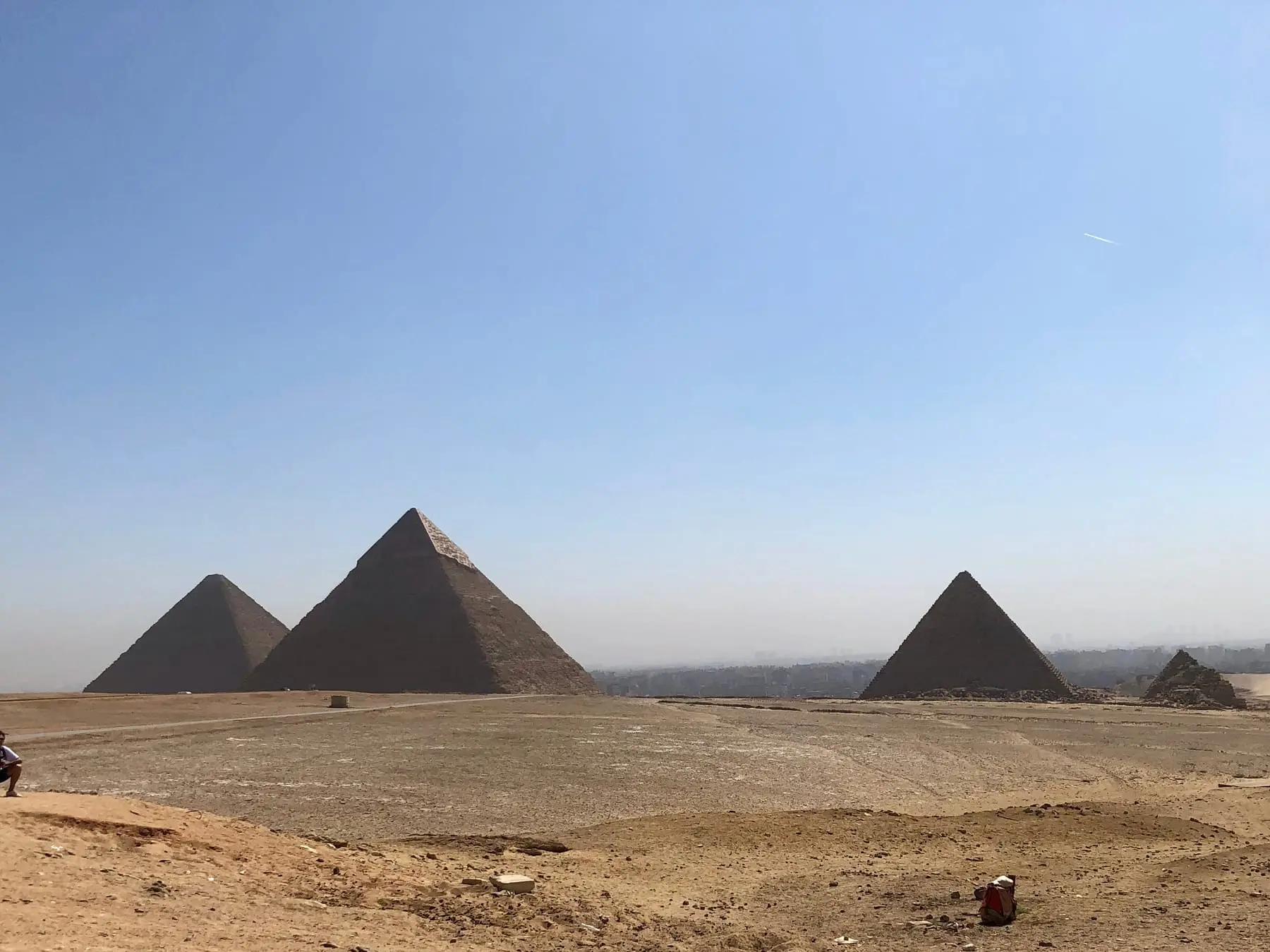 The pyramids of Giza on the desert plateau, a few kilometres from the Grand Egyptian Museum