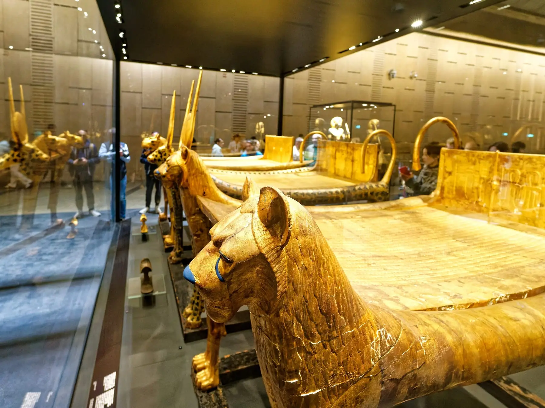 Tutankhamun’s gilded funerary beds with animal heads in the Tutankhamun galleries